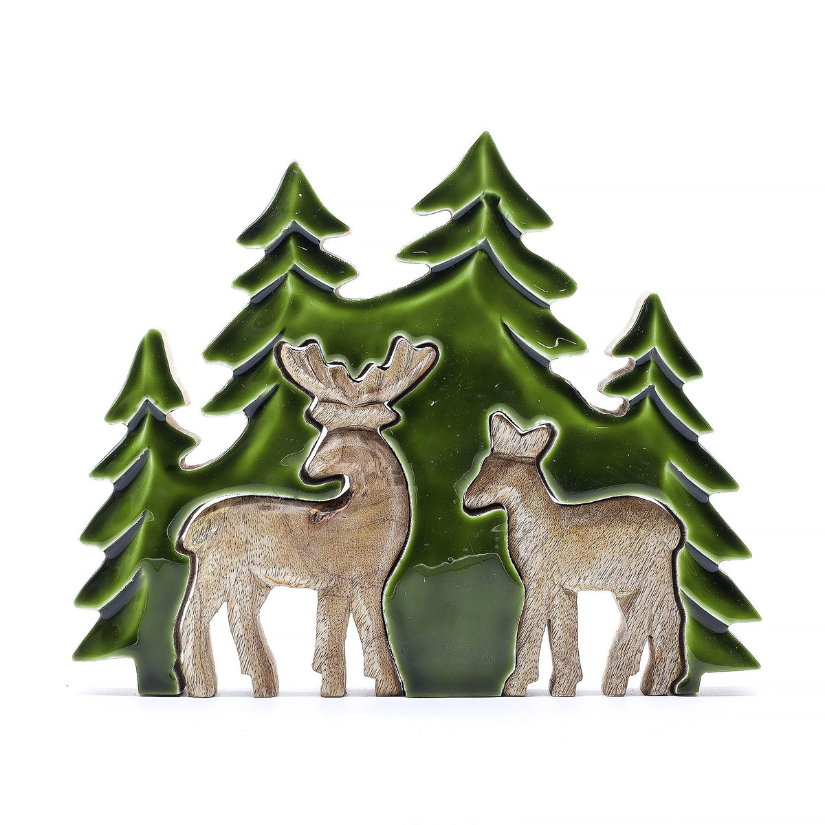 Two Deer wooden decoration on a white background, green trees behind the stag and doe