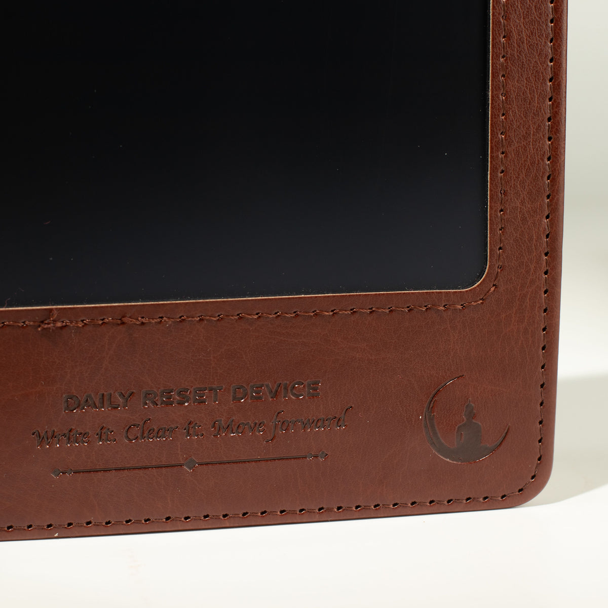Close-up of the cover's embossed wording and detail