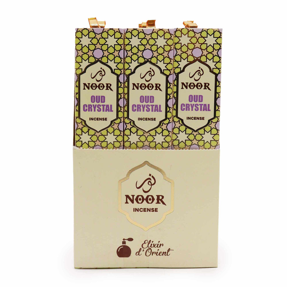 Noor Oud Incense, Crystal in a cream display box with three patterned cartons visible at the top