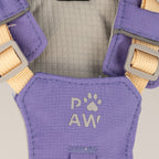 Close-up of the lavender harness fabric and PAW logo