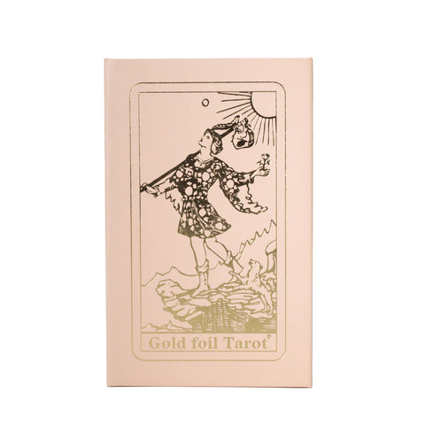 Pink Box Ruby Foil Tarot Card Gift Box Set with booklet, front view with gold foil Fool design