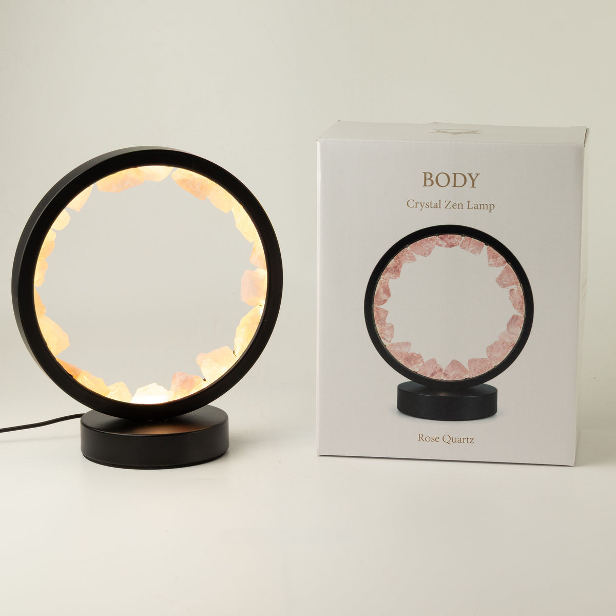 Rose quartz halo lamp beside its product box