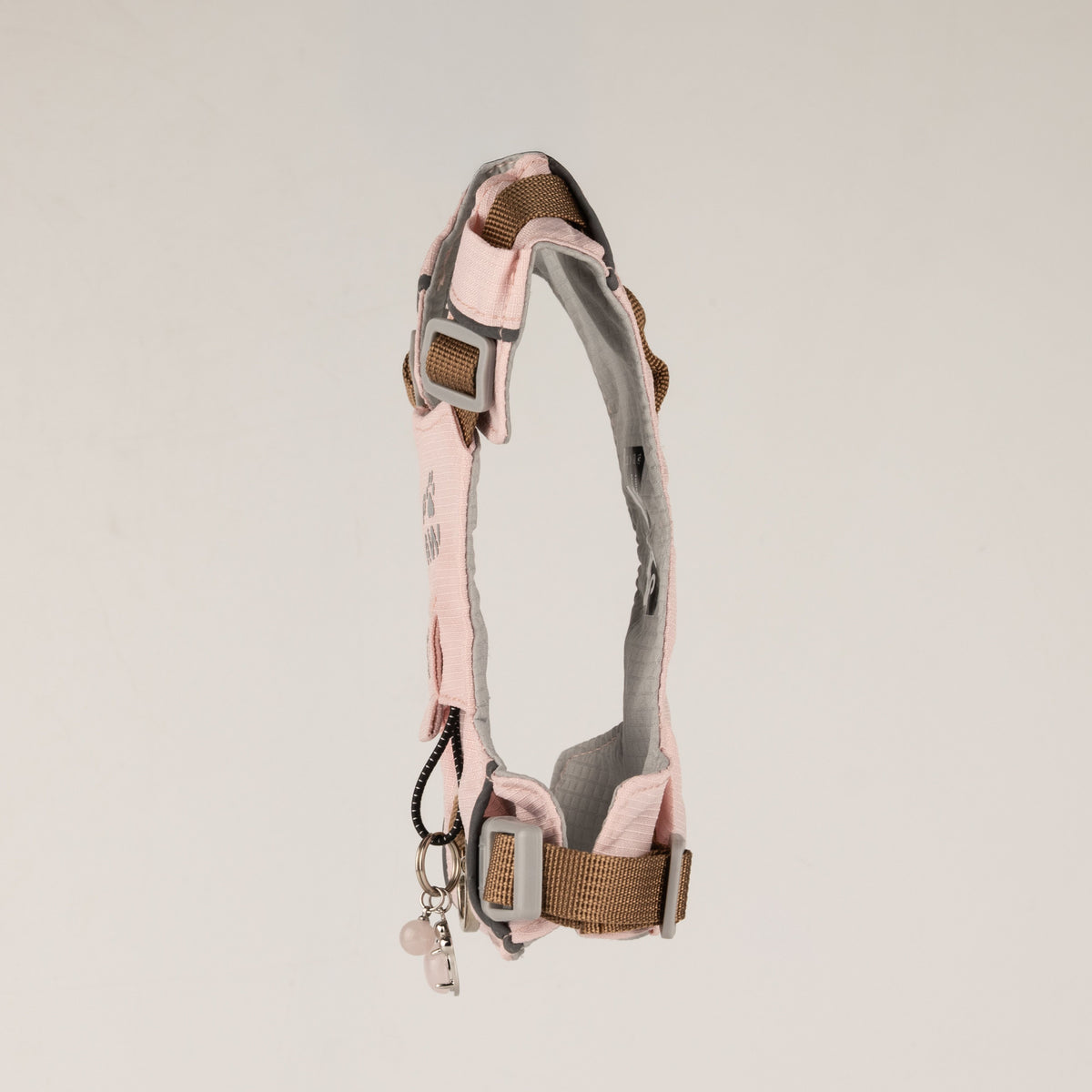 Side profile showing the harness shape and adjustable strap