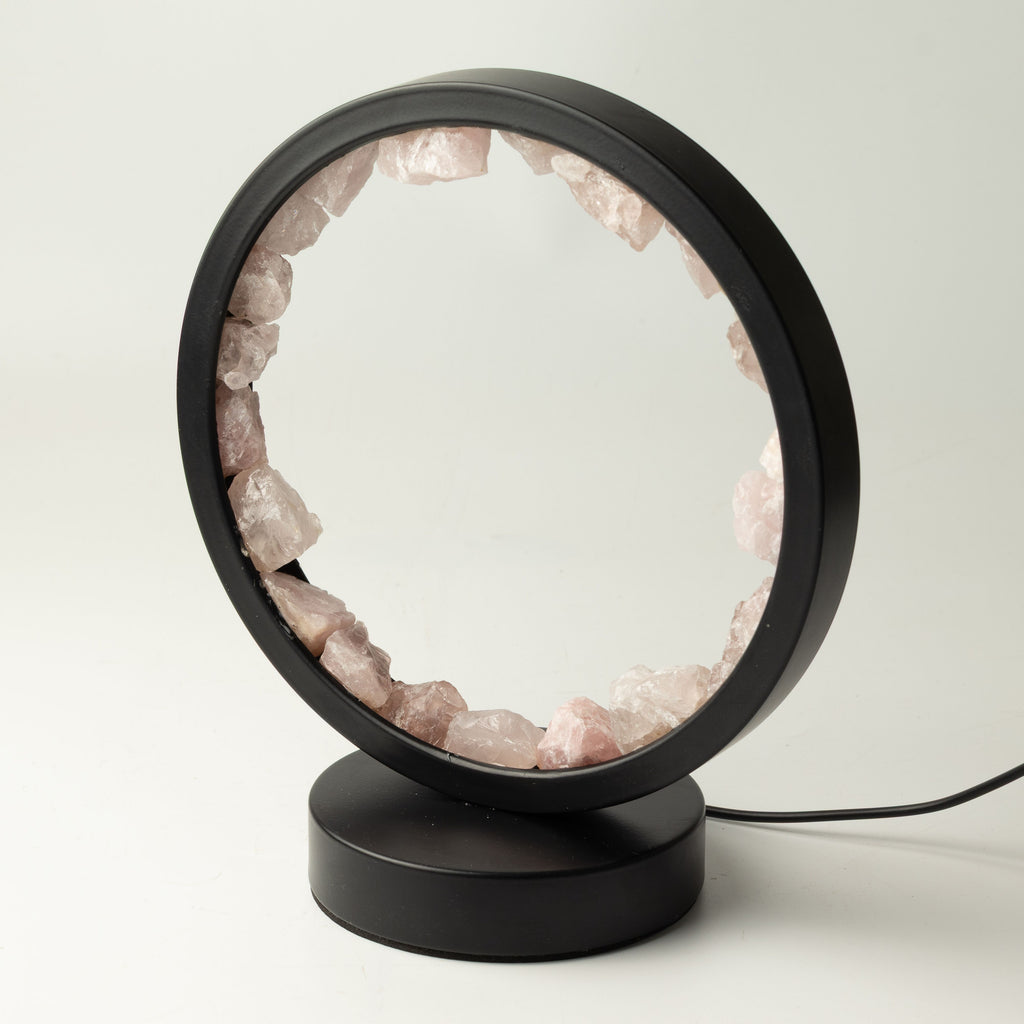 Unlit rose quartz pieces set around the circular frame