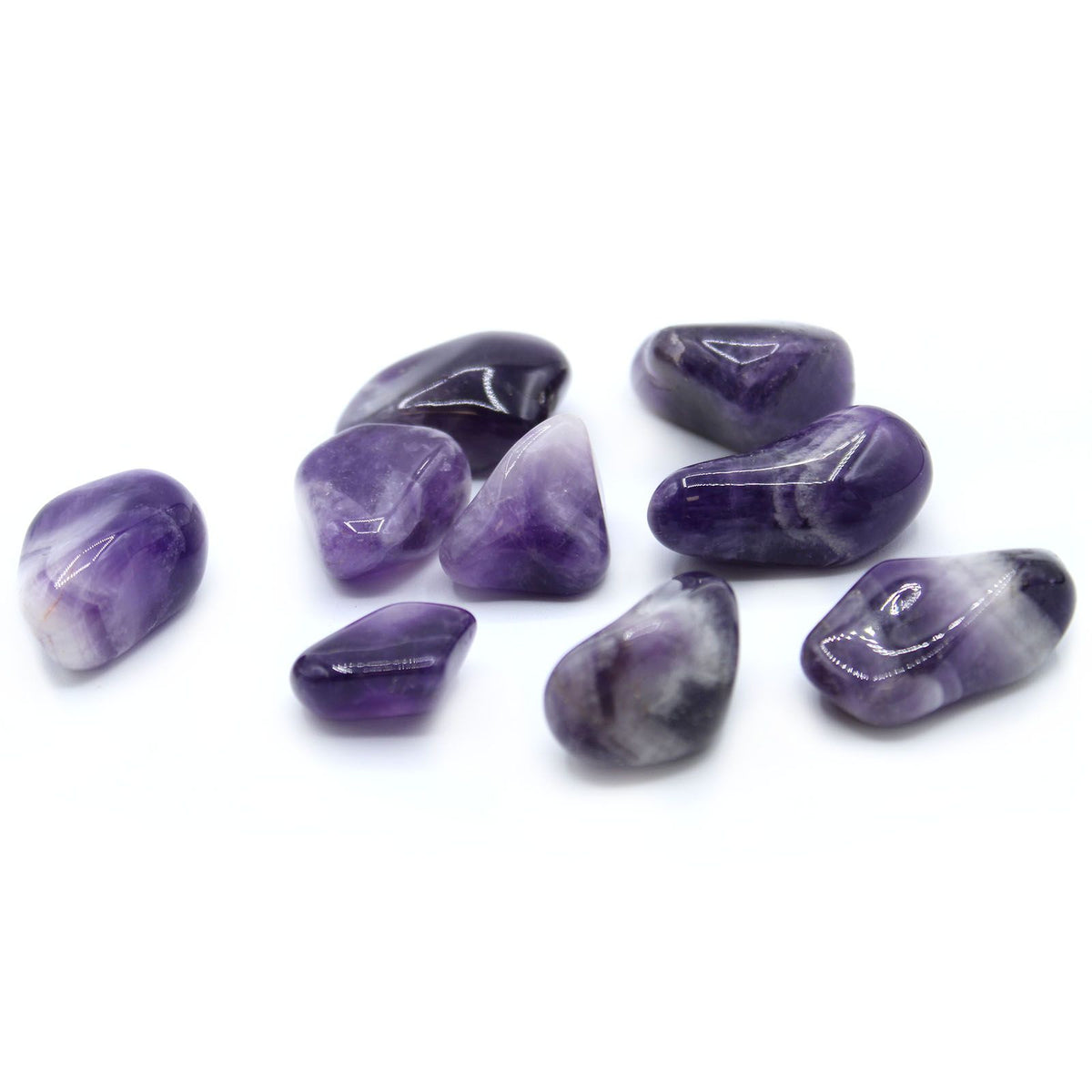 L Tumble Stones, Amethyst Banded, several polished purple stones scattered on a white background