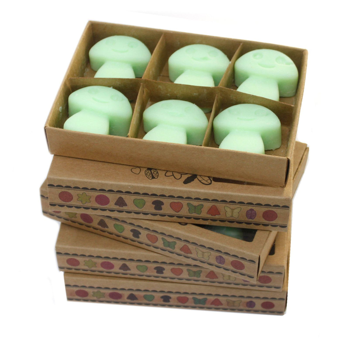 Box of 6 Wax Melts, Liquorice in pale green, shown in an open divided kraft box on patterned boxes