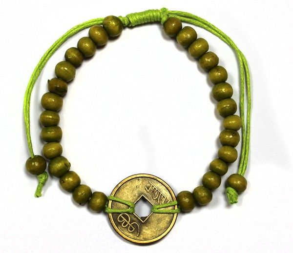Lime green Feng Shui bracelet with wooden beads and a central coin