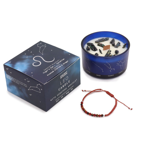 Leo candle and closed gift box standing together with the gemstone bracelet in front