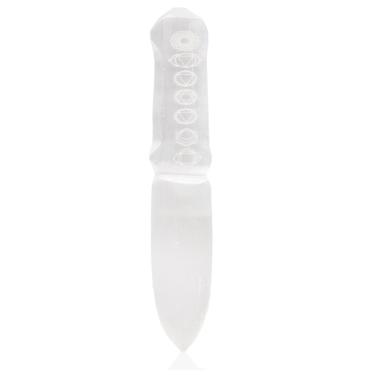 Selenite knife upright against white, shown from the front with engraved chakra symbols