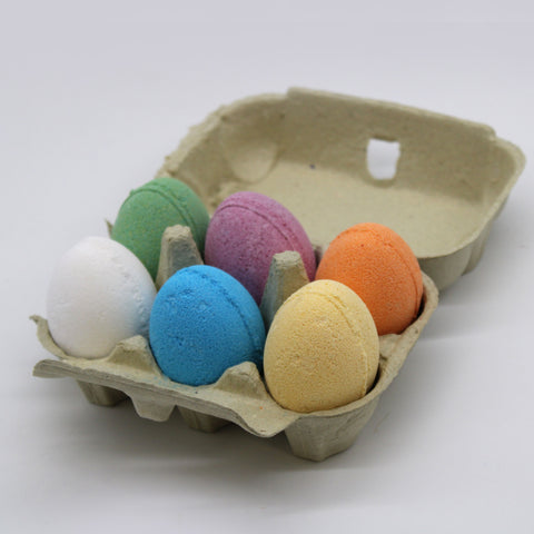6 Bath Eggs in a Tray, Mixed Tray, six colourful eggs nestled in an open beige carton