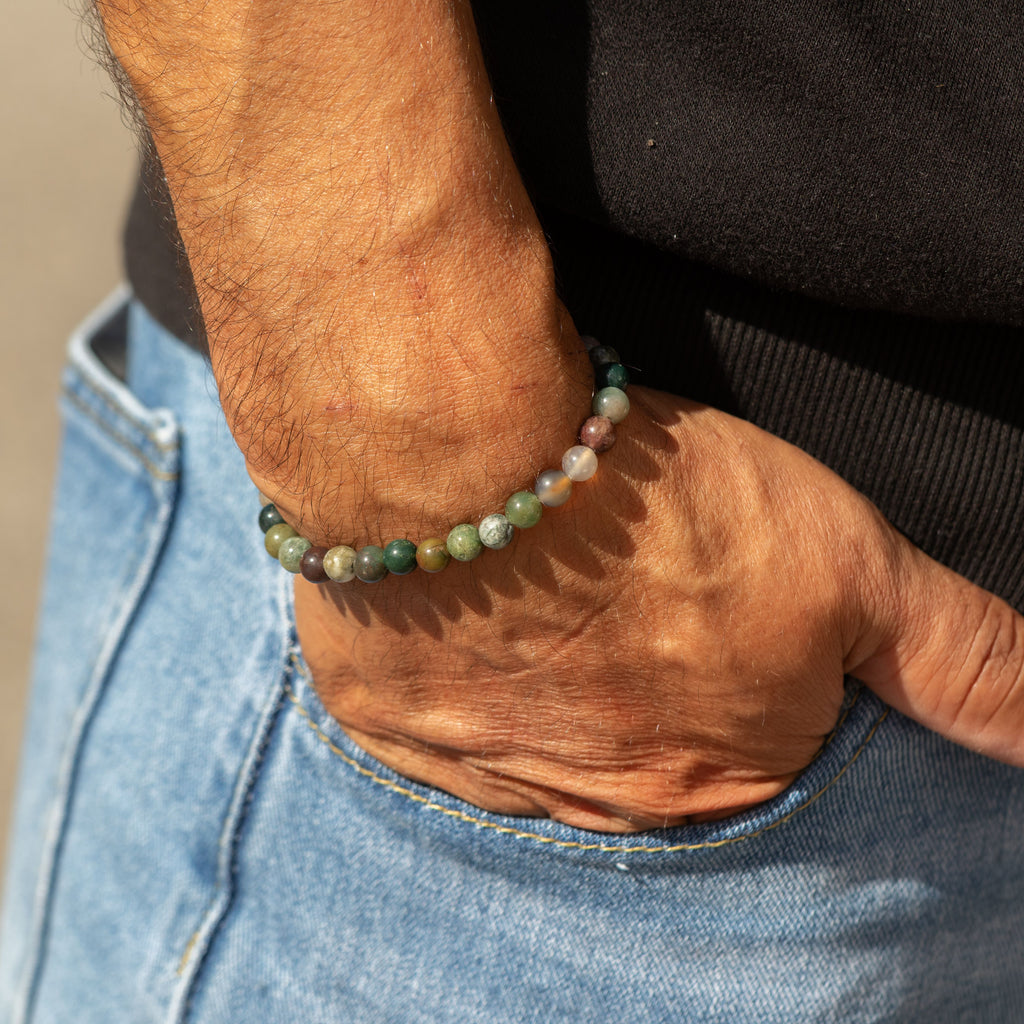Moss Agate bracelet worn with a dark top and jeans