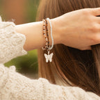 Bracelets worn together on a wrist