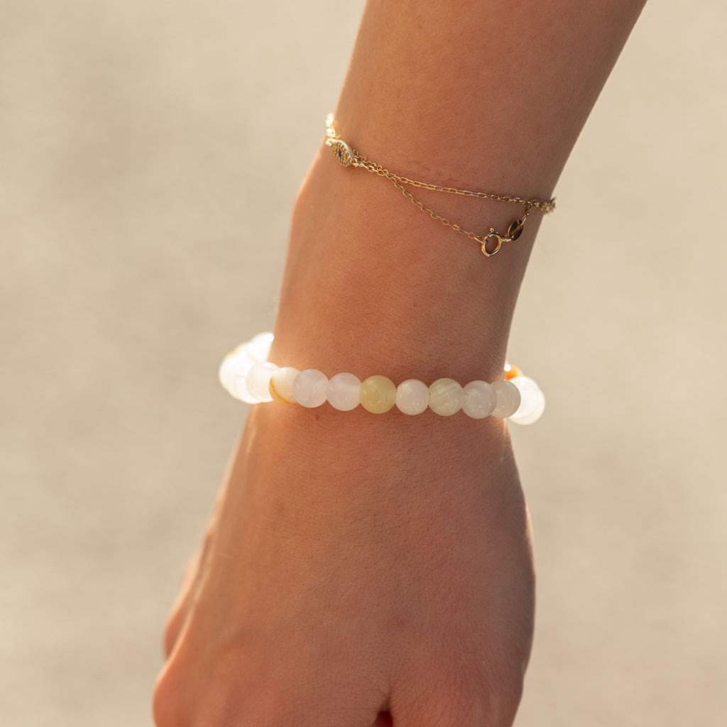 Moon Jade bracelet worn on a wrist
