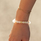 Moon Jade bracelet worn on a wrist