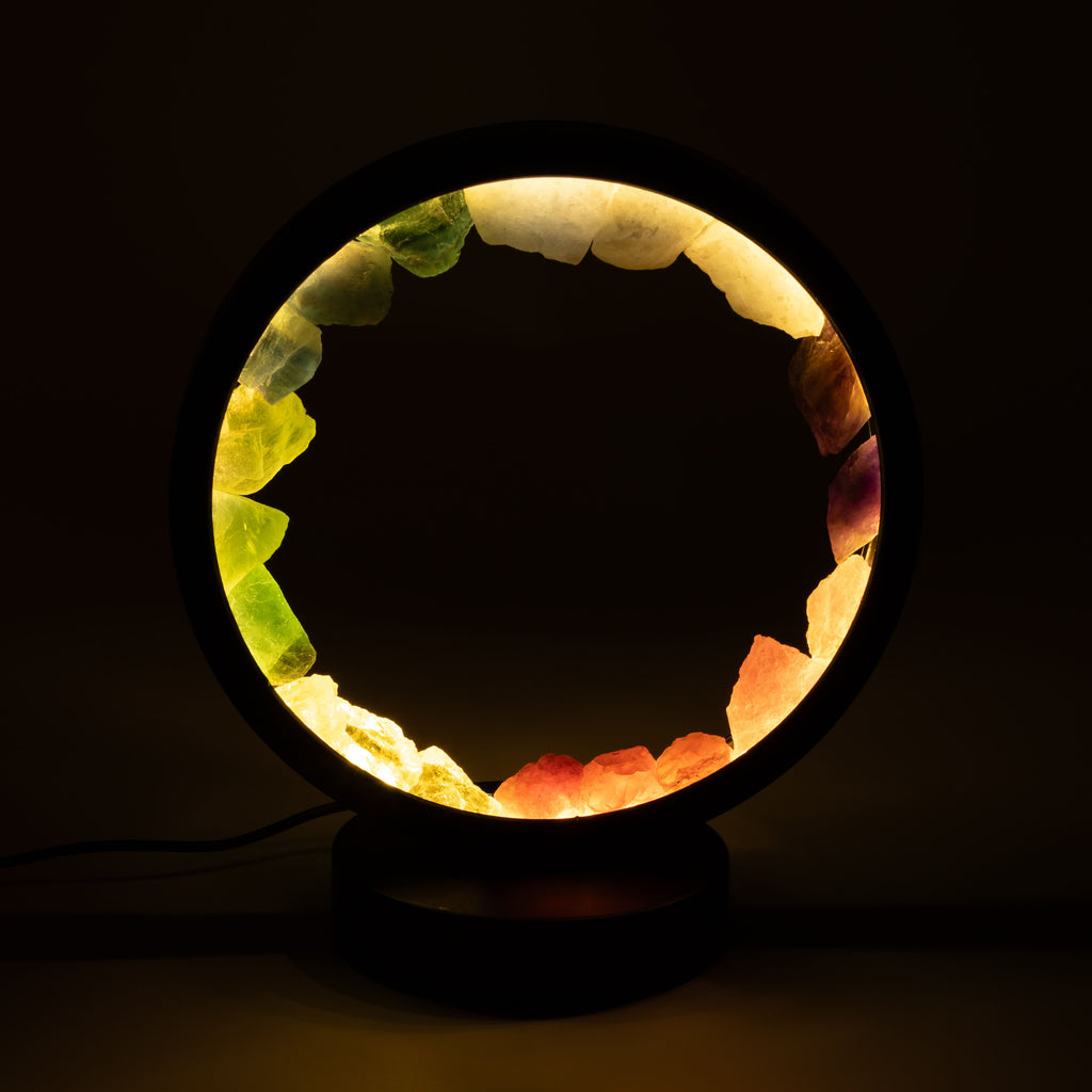 Gemstone halo lamp glowing against a dark background