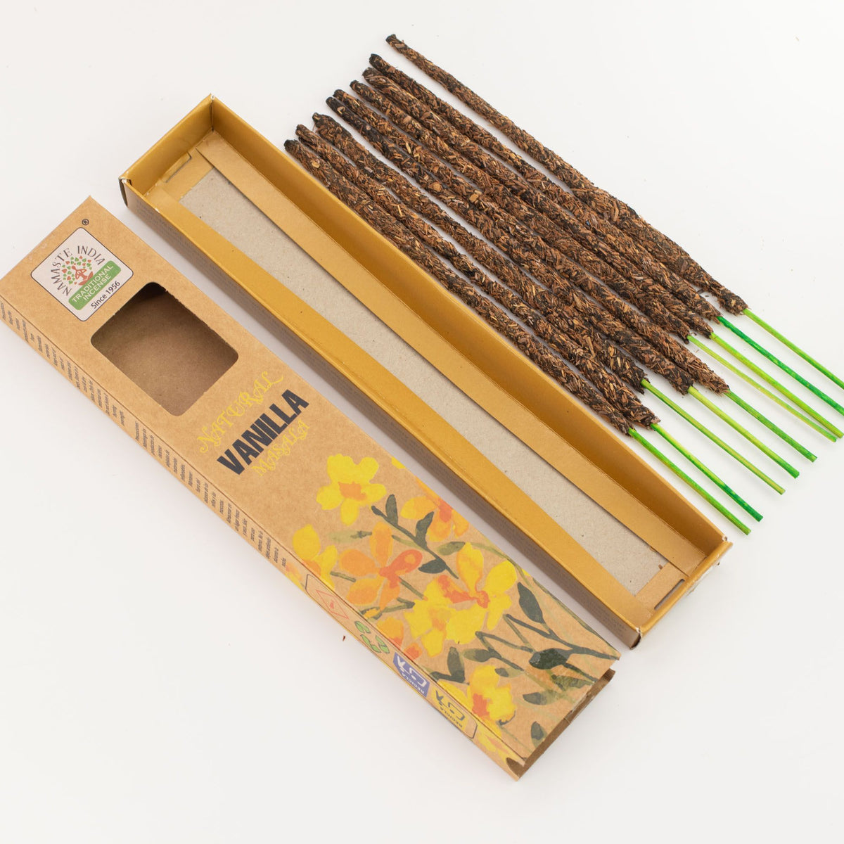 Natural Botanical Vanilla incense box open with loose sticks fanned out beside it