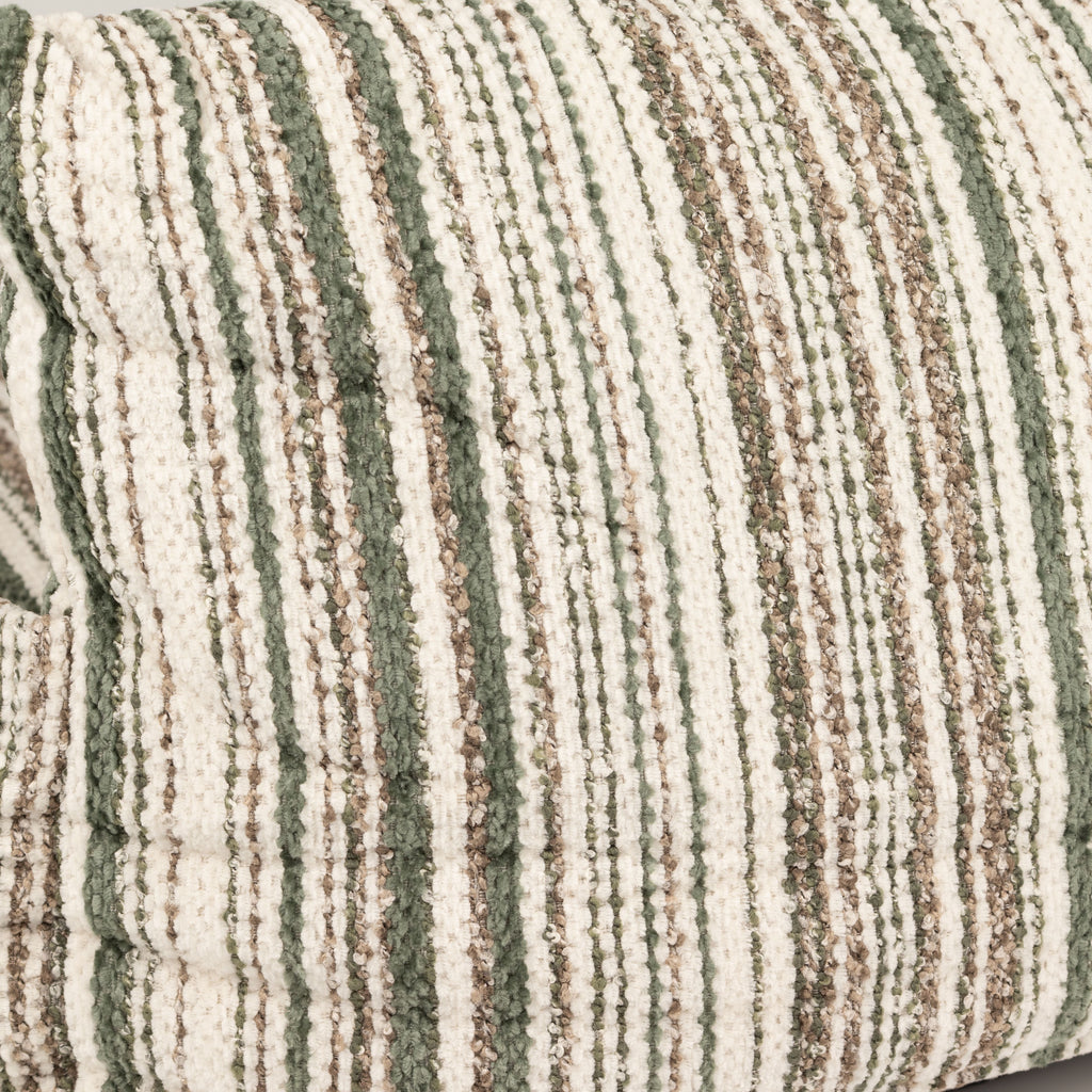Close-up of the bed’s textured striped fabric