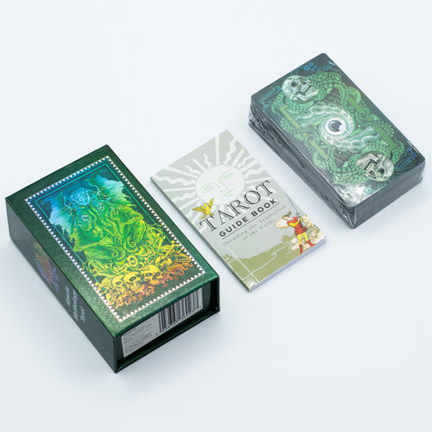 Foil Tarot Card Set, Kesulu Mythology, with booklet, box, cards and guide book arranged on a white surface