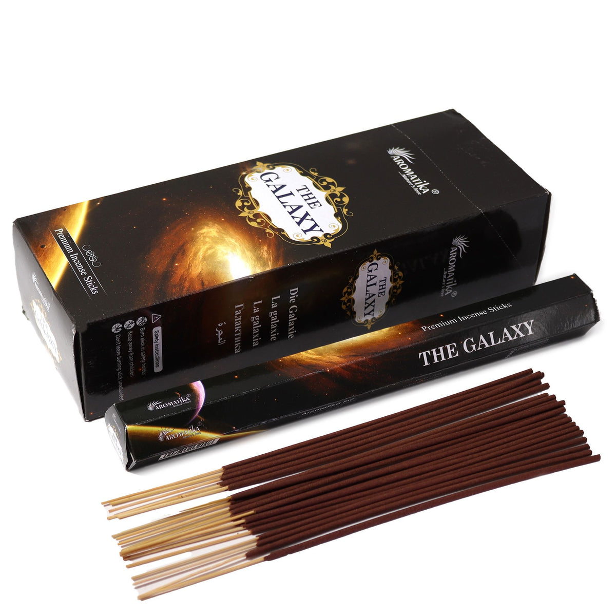 The Galaxy incense in a black printed box and sleeve, with a bundle of brown sticks laid out in front