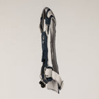 Side view showing the harness profile and charm