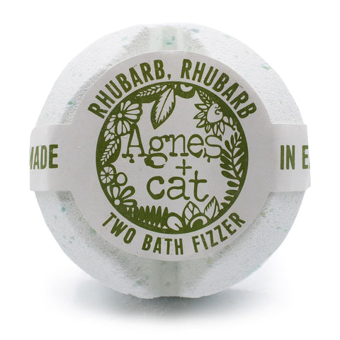 Agnes + Cat bath fizzer in its white printed wrapper, shown close up against a white background
