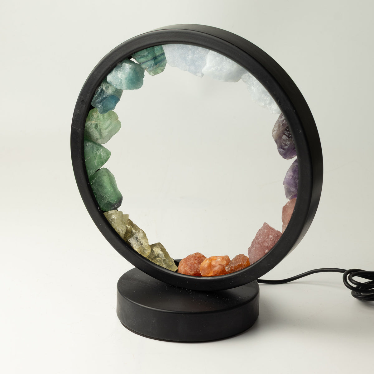 Unlit halo lamp showing its gemstone ring and black base