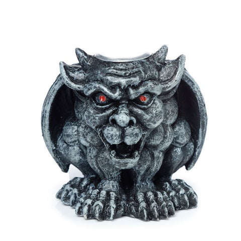 Gargoyle burner shown head-on, with red eyes, spread wings and a silver cone holder on a white background