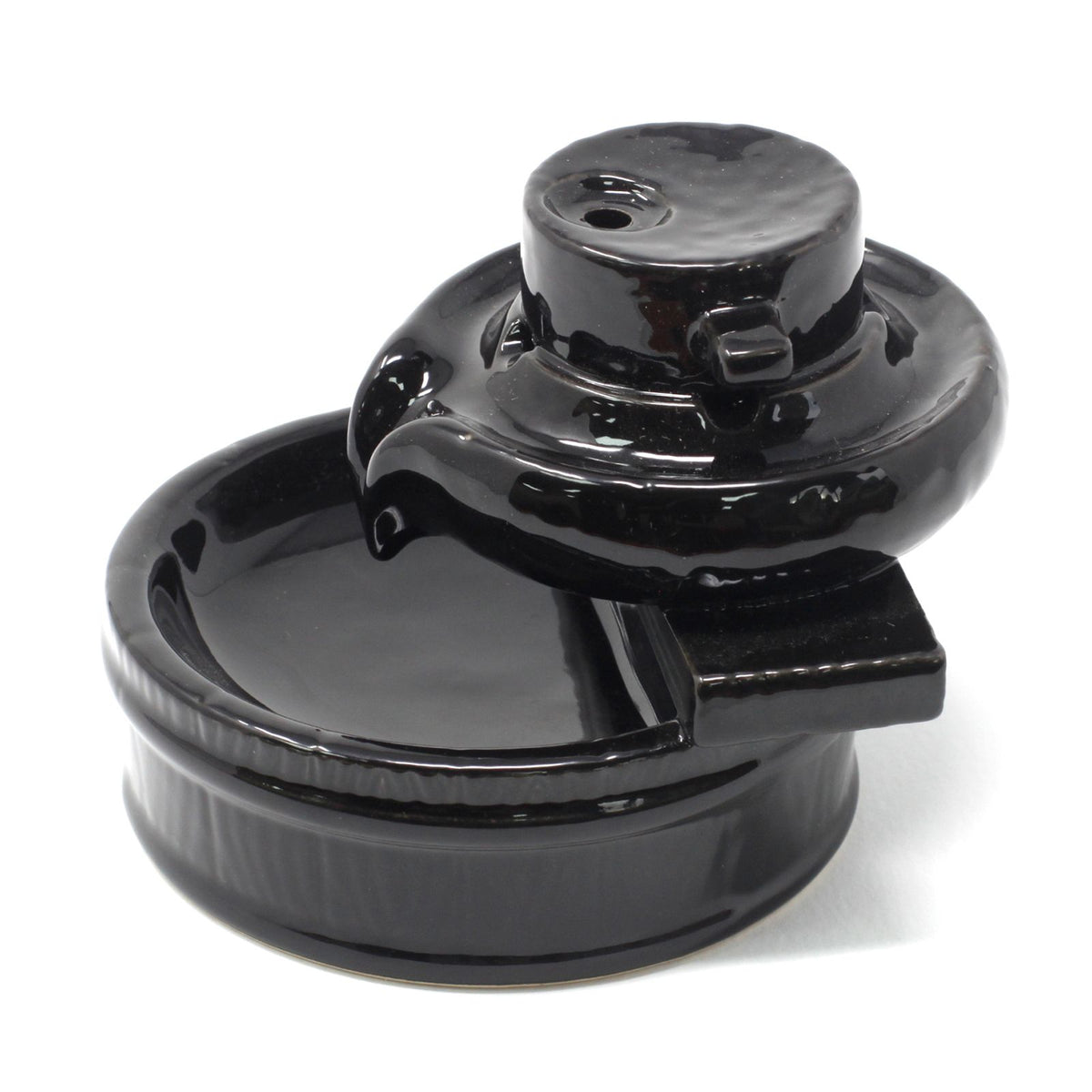 Backflow Incense Burner, Zen Flow, glossy black burner shown at an angle against a white background