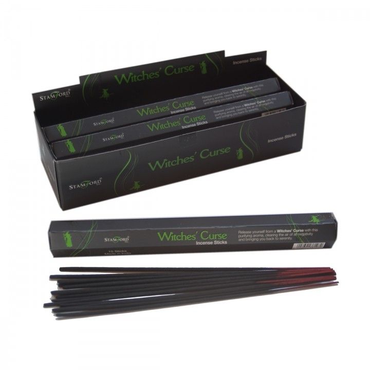 Witch's Curse Incense Sticks in black and green packaging, shown in an open display box with loose sticks